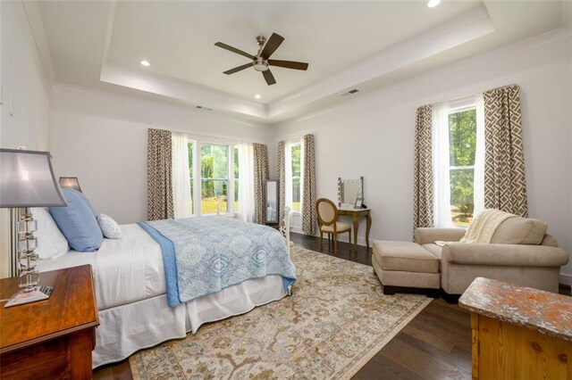 400 Fox Valley Dr, Monroe, GA 30656 - bedroom featuring a tray ceiling, multiple windows, dark wood-type flooring, recessed lighting, and ceiling fan