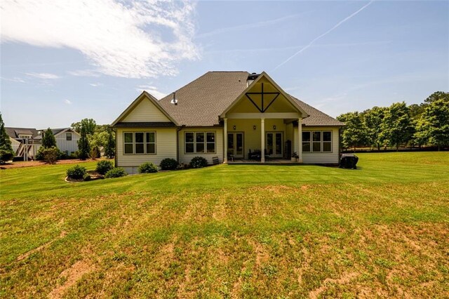 400 Fox Valley Dr, Monroe, GA 30656 - back of property with a chimney, a lawn, roof with shingles, and cooling unit