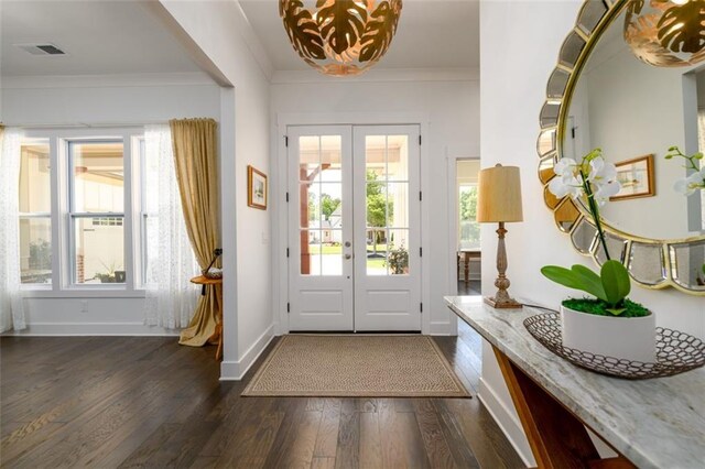 400 Fox Valley Dr, Monroe, GA 30656 - foyer featuring french doors, dark wood-type flooring, crown molding, and baseboards
