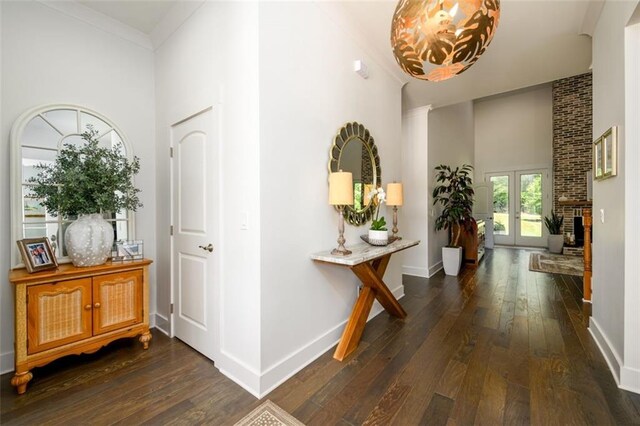 400 Fox Valley Dr, Monroe, GA 30656 - foyer featuring dark wood finished floors, a high ceiling, baseboards, and crown molding