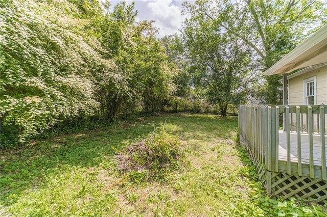 view of yard with a wooden deck