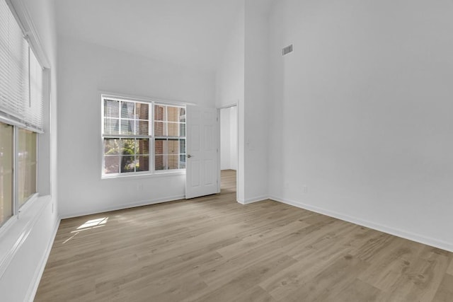 1249 Creek Forest Ln Bldg 8, Austell, GA 30106 - empty room with light wood-style floors and a high ceiling