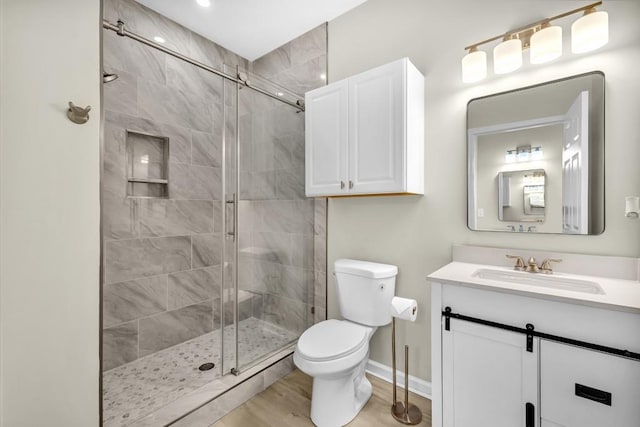1249 Creek Forest Ln Bldg 8, Austell, GA 30106 - full bathroom with vanity, a stall shower, and wood finished floors