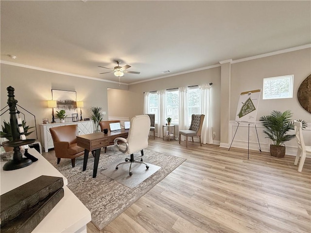 office area featuring crown molding, ceiling fan, and light wood-type flooring