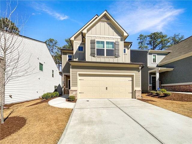 craftsman house with concrete driveway, a garage, brick siding, and board and batten siding