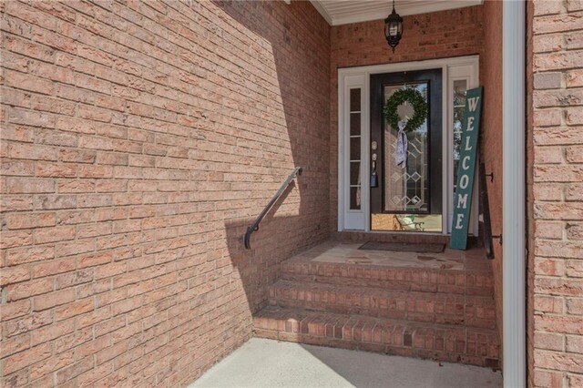 view of exterior entry featuring a porch