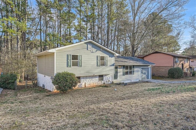 split level home with a garage