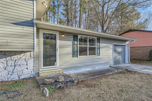 entrance to property with a garage