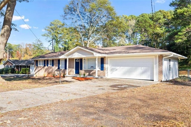 single story home with a garage