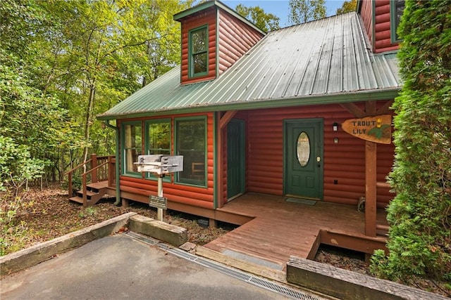 view of front of home with a wooden deck