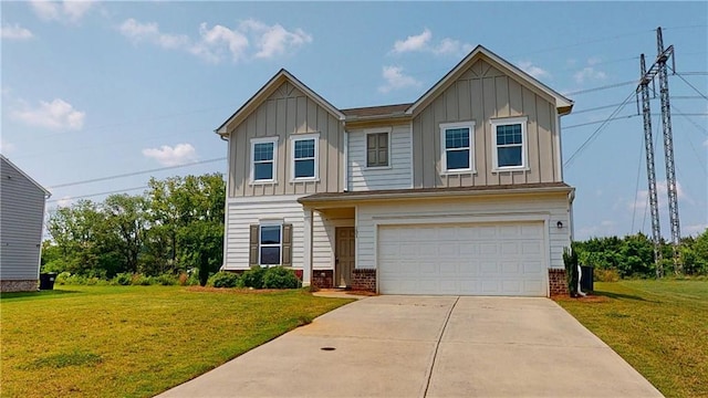 131 Andria Way, Cartersville, GA 30120 - view of front facade featuring board and batten siding, a garage, and a front yard