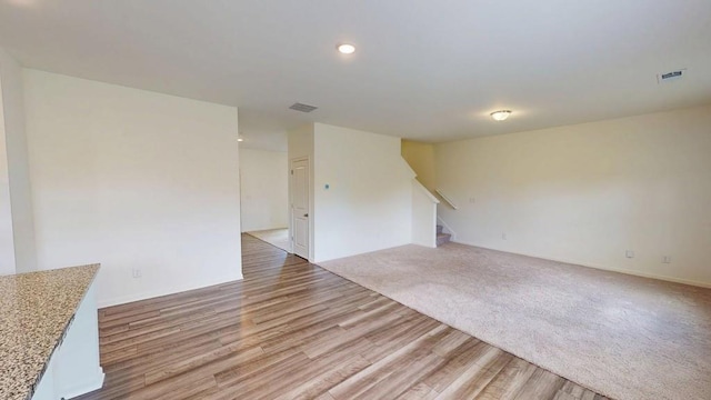 131 Andria Way, Cartersville, GA 30120 - unfurnished living room featuring stairway, light wood-type flooring, and recessed lighting