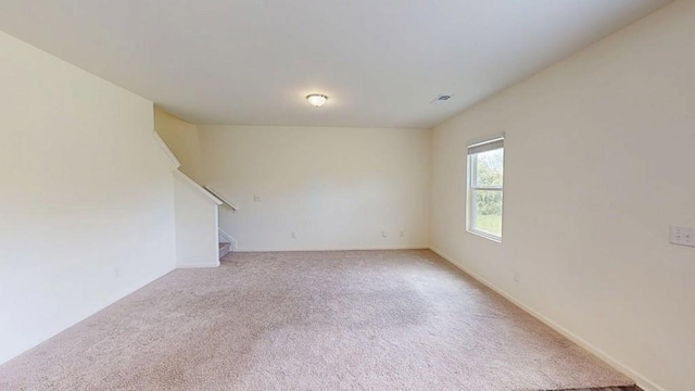 131 Andria Way, Cartersville, GA 30120 - empty room featuring light colored carpet, stairs, and baseboards