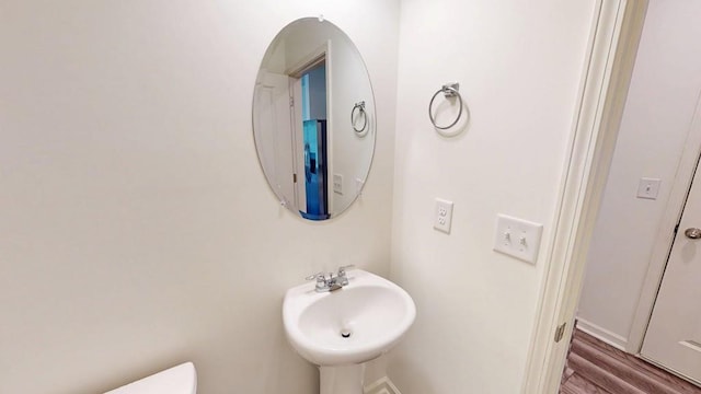 131 Andria Way, Cartersville, GA 30120 - half bathroom with toilet, baseboards, wood finished floors, and a sink