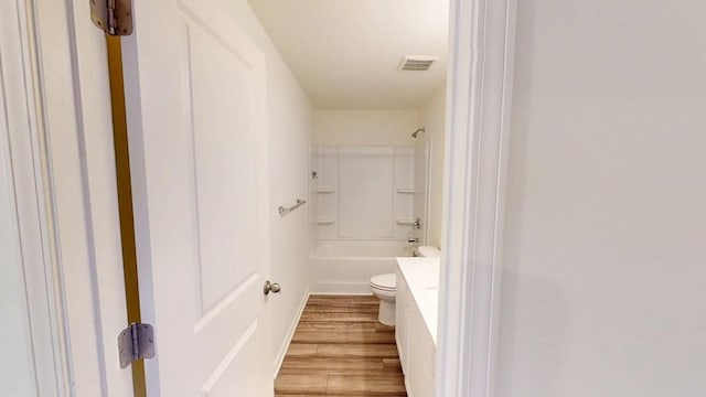 131 Andria Way, Cartersville, GA 30120 - bathroom featuring wood finished floors, toilet, vanity, and  shower combination