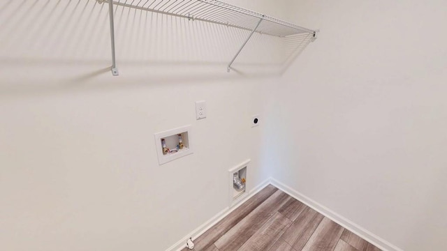 131 Andria Way, Cartersville, GA 30120 - washroom featuring hookup for an electric dryer, baseboards, hookup for a washing machine, and wood finished floors