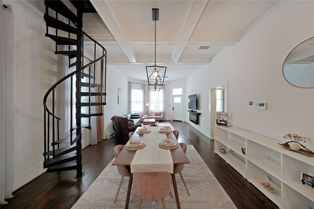 dining space with dark wood-style flooring, visible vents, beam ceiling, coffered ceiling, and stairs