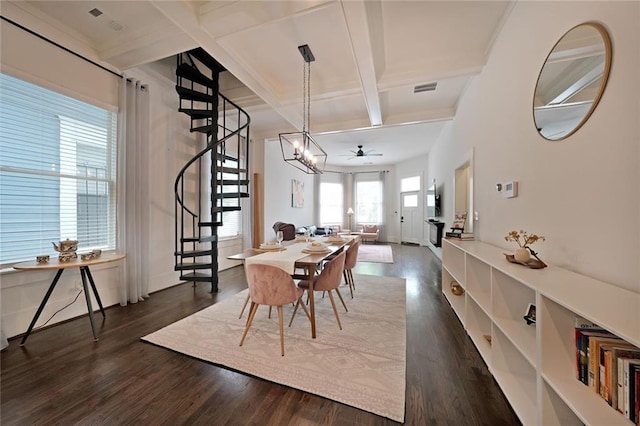dining space with visible vents, beamed ceiling, dark wood-style floors, stairway, and coffered ceiling
