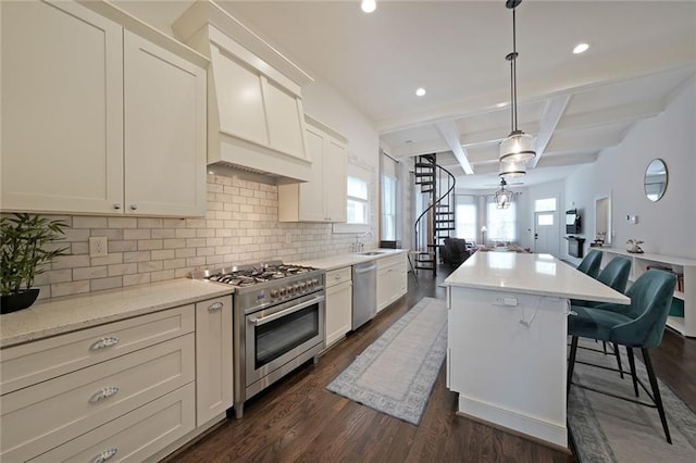kitchen with dark wood-style flooring, appliances with stainless steel finishes, decorative backsplash, and coffered ceiling