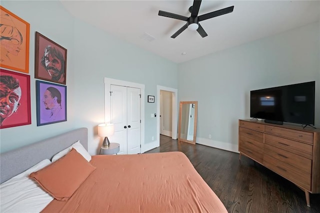 bedroom featuring baseboards, visible vents, ceiling fan, and dark wood-type flooring