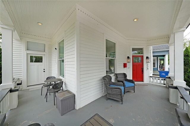 view of patio featuring a porch