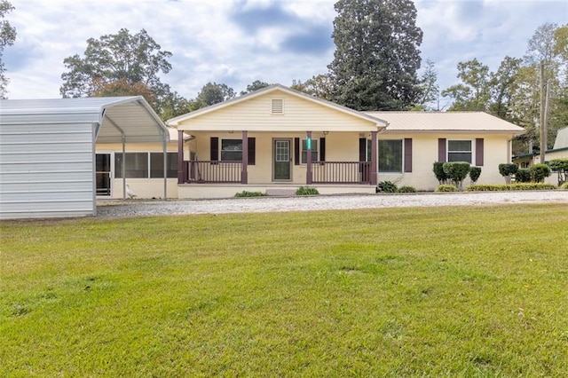 ranch-style home with a sunroom, covered porch, and a front yard