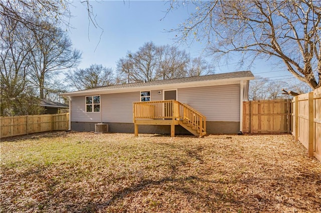 back of house with a wooden deck