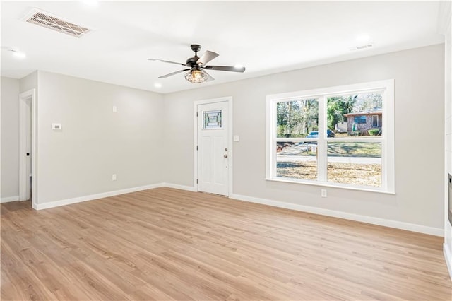 interior space featuring ceiling fan and light wood-type flooring