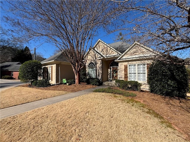 view of front of home featuring stone siding