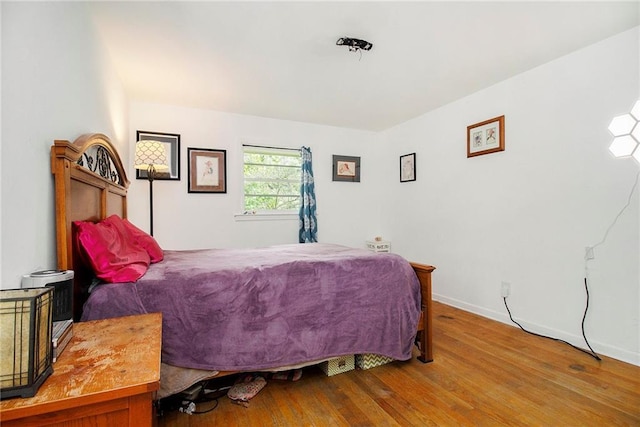 3055 Henderson Mill Rd, Atlanta, GA 30341 - bedroom with wood finished floors and baseboards