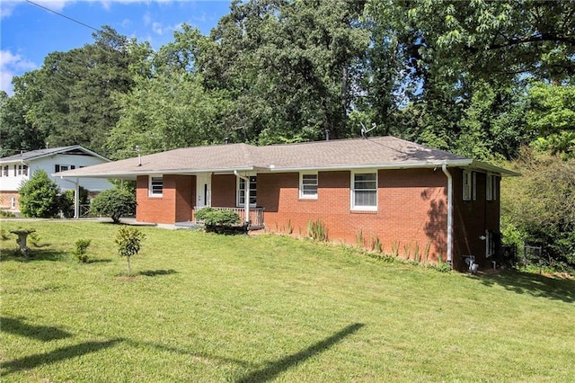 3055 Henderson Mill Rd, Atlanta, GA 30341 - ranch-style house featuring a porch, brick siding, and a front lawn