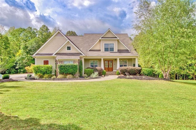 craftsman-style home with a front yard