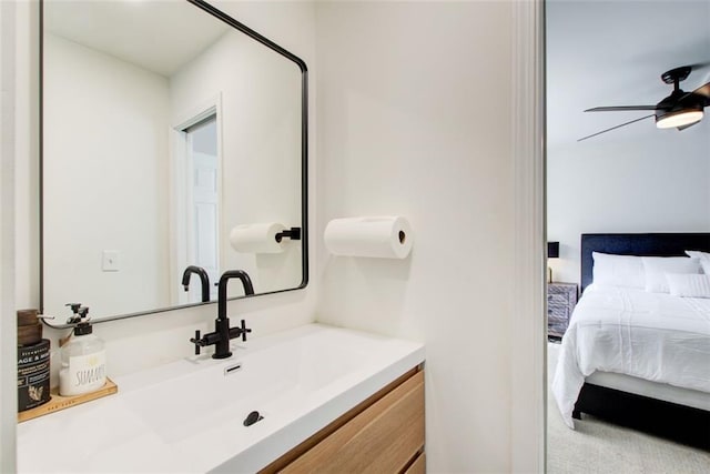 bathroom featuring ceiling fan and vanity