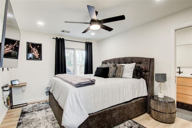 bedroom with ceiling fan and light wood-type flooring