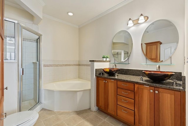 full bathroom with crown molding, vanity, and independent shower and bath