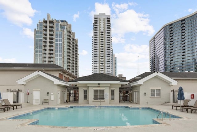 view of swimming pool featuring a patio