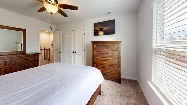 bedroom featuring carpet floors, ceiling fan, and baseboards