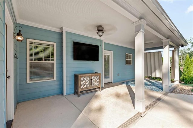 view of patio / terrace with a ceiling fan