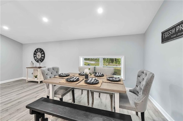 dining space featuring light wood-type flooring