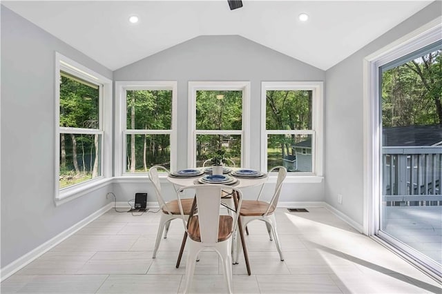 sunroom with vaulted ceiling