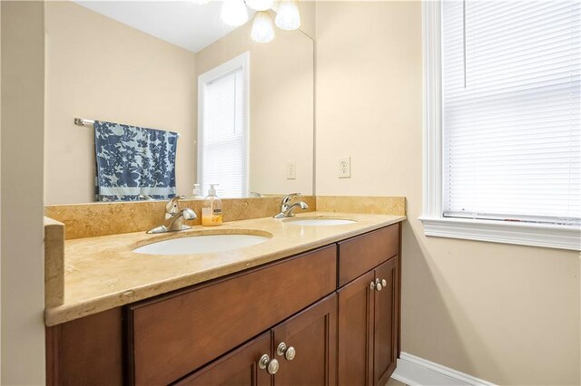 3460 Drayton Manor Run, Lawrenceville, GA 30046 - bathroom with vanity, tile patterned flooring, and baseboards