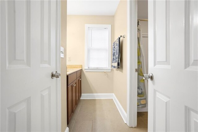 3460 Drayton Manor Run, Lawrenceville, GA 30046 - laundry area with baseboards, cabinet space, and independent washer and dryer