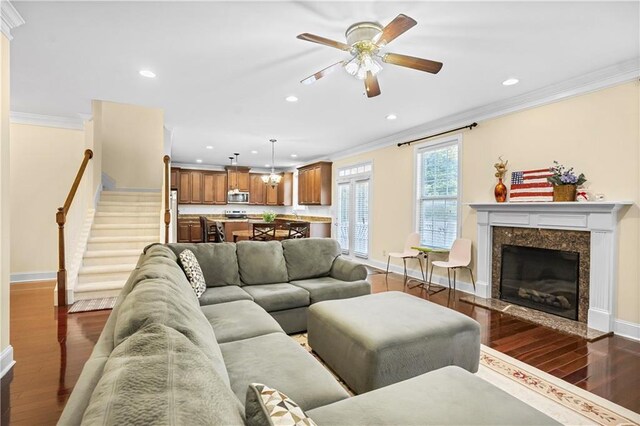 3460 Drayton Manor Run, Lawrenceville, GA 30046 - dining room with arched walkways, a chandelier, crown molding, baseboards, and dark wood-type flooring