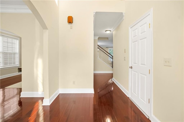 3460 Drayton Manor Run, Lawrenceville, GA 30046 - hall with arched walkways, hardwood / wood-style floors, baseboards, crown molding, and stairs