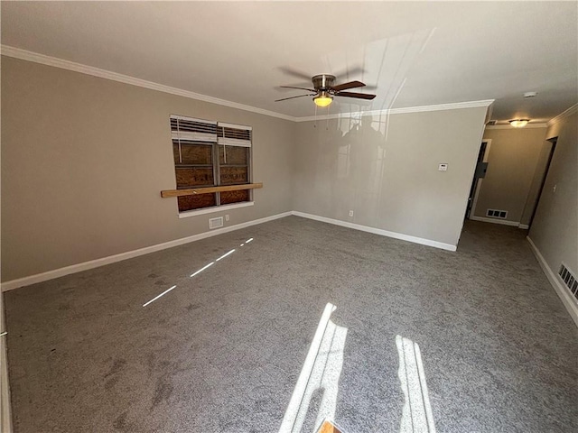 unfurnished room with ceiling fan and crown molding