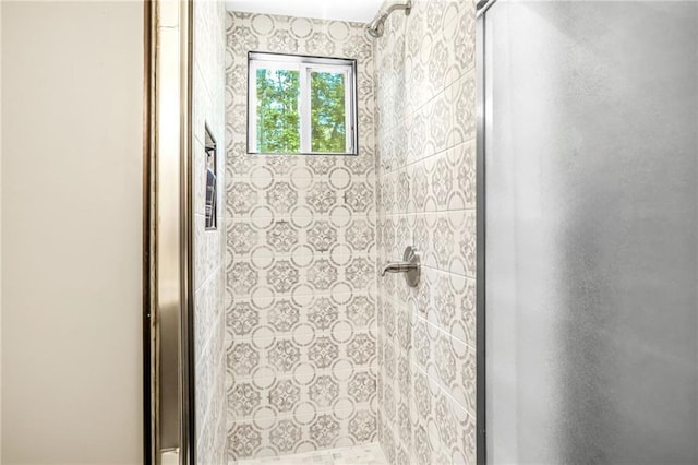 full bathroom featuring a stall shower