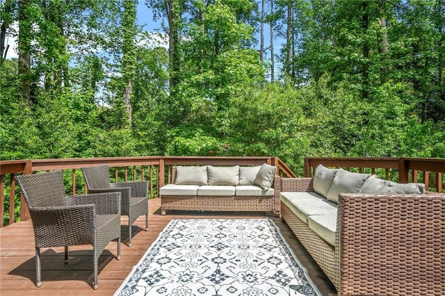 wooden terrace with outdoor lounge area