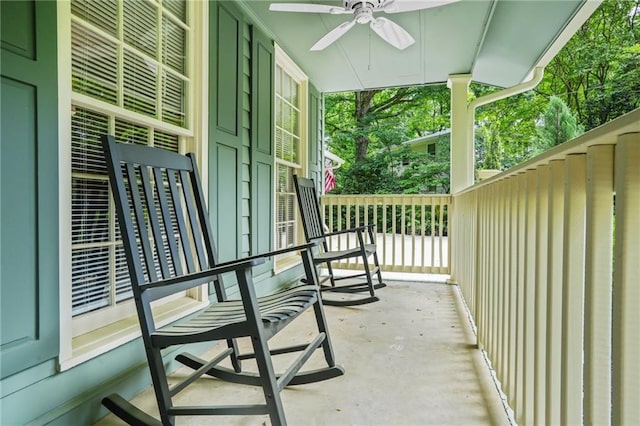 balcony featuring covered porch and a ceiling fan