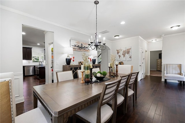 176 Red Wood Dr, Dallas, GA 30132 - dining area with dark wood-style flooring, visible vents, crown molding, an inviting chandelier, and recessed lighting
