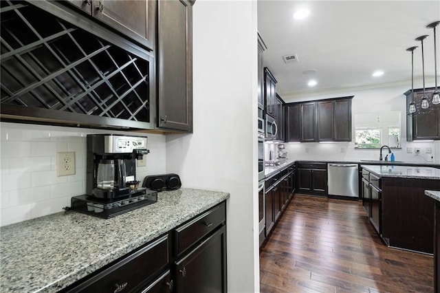 176 Red Wood Dr, Dallas, GA 30132 - kitchen with visible vents, light stone countertops, backsplash, and dishwasher